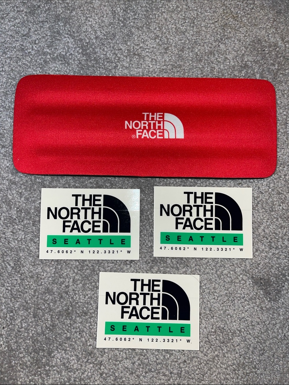 Northface stickers (3) and slap koozie (1)